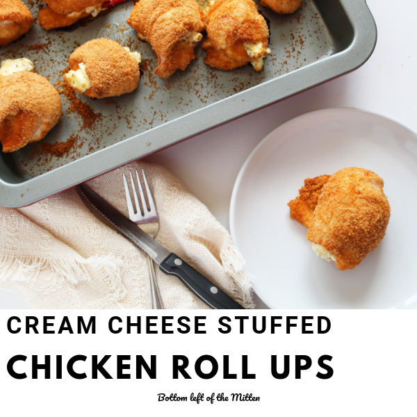 Cream Cheese Stuffed Chicken Roll Ups baked in a pan and ready to eat.