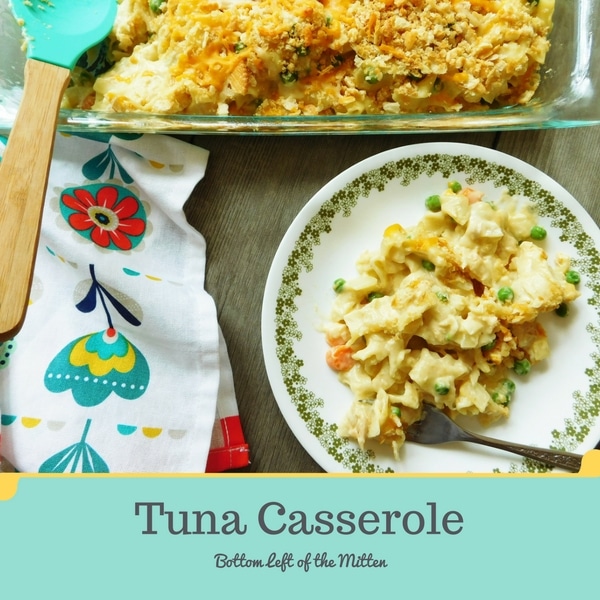 Tuna casserole served on a plate and in a casserole dish in the background.