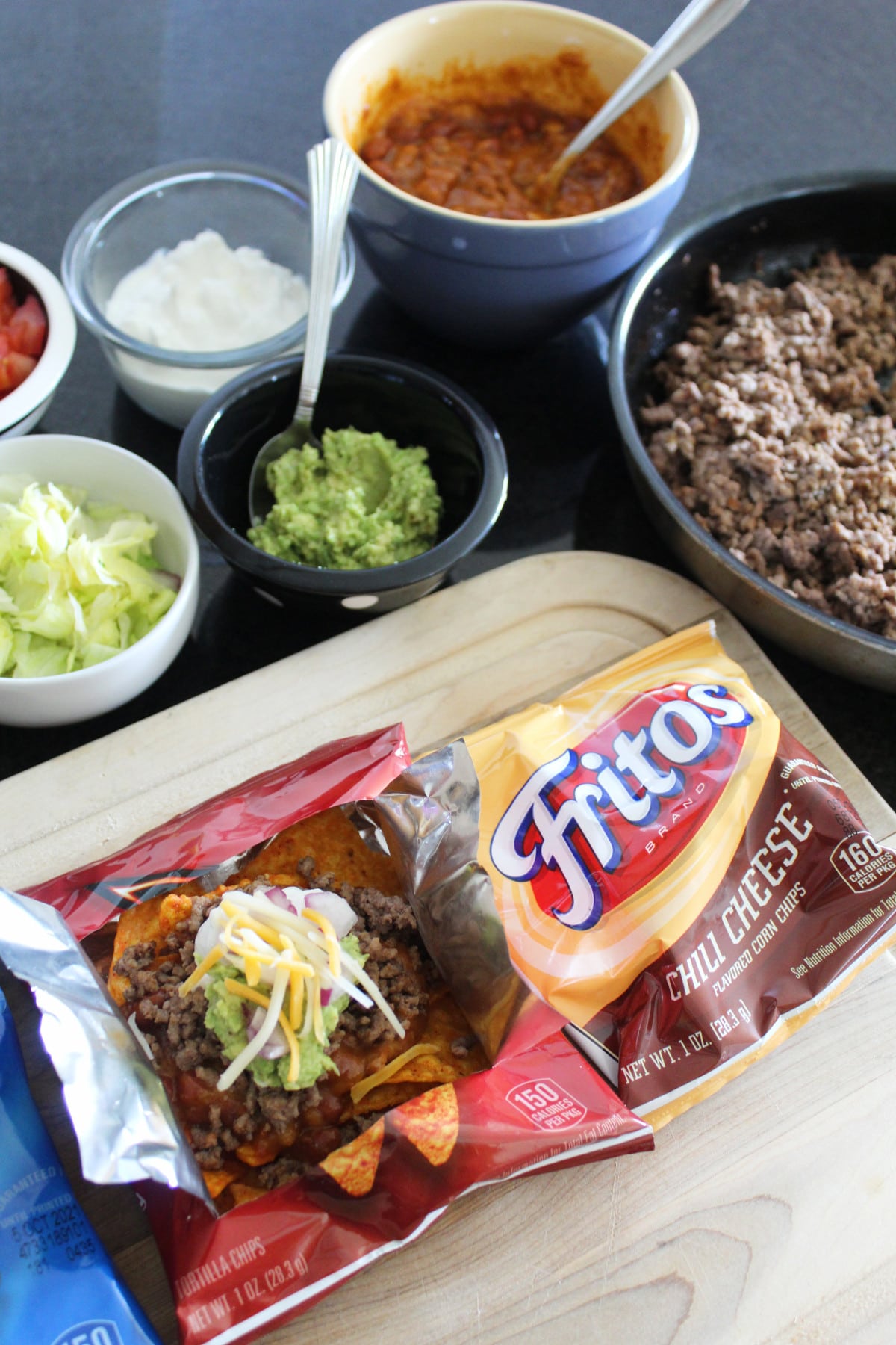 tacos to go with a variety of toppings for walking tacos shot overhead.