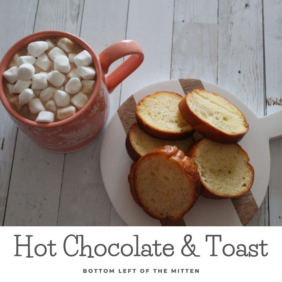 Buttered toast with a mug of hot chocolate and marhsmallows on the side.